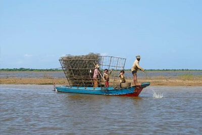 Tonle Sap floating village sunset boat tour